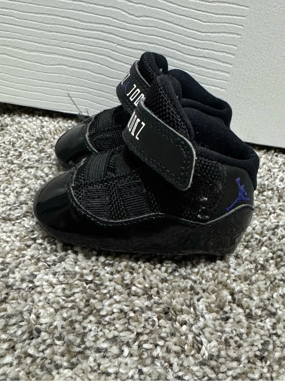 Jordan Black Infant High-Top Sneakers with Purple Jumpman Accent